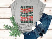 Buy Christmas Trendy Repeating Text Unisex T-Shirt - Gift Solutions